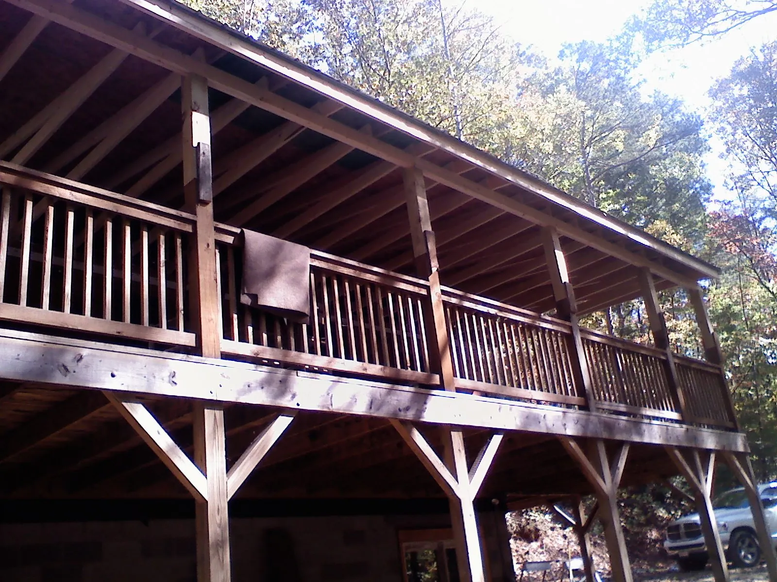 Timber framing under a new elevated porch and deck — Roof Leak Repair in Mosheim by Roofing Brothers